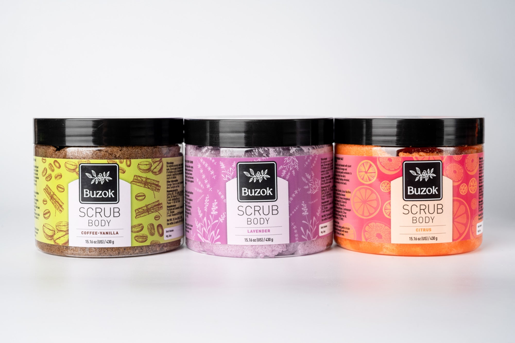 Assorted natural body scrubs featuring lavender, citrus, and coffee vanilla scents.