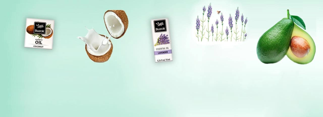 Collection of cosmetic oil, essential lavender oil and natural products including a coconut, avocado, and lavender on a light green background.