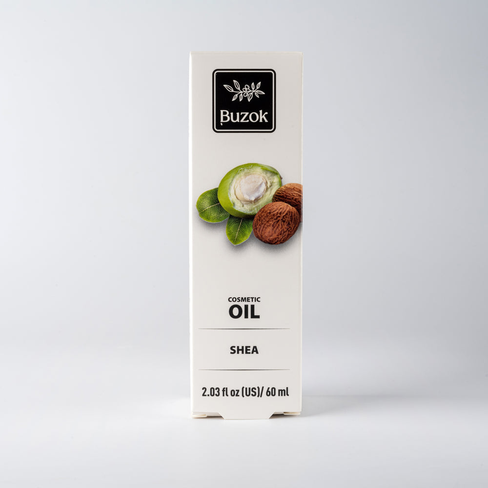Box of Buzok Shea cosmetic oil on a white background